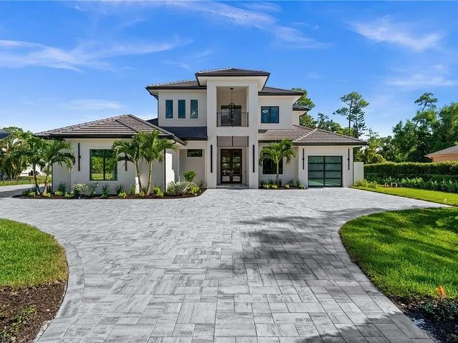 Front elevation and circular paver drive